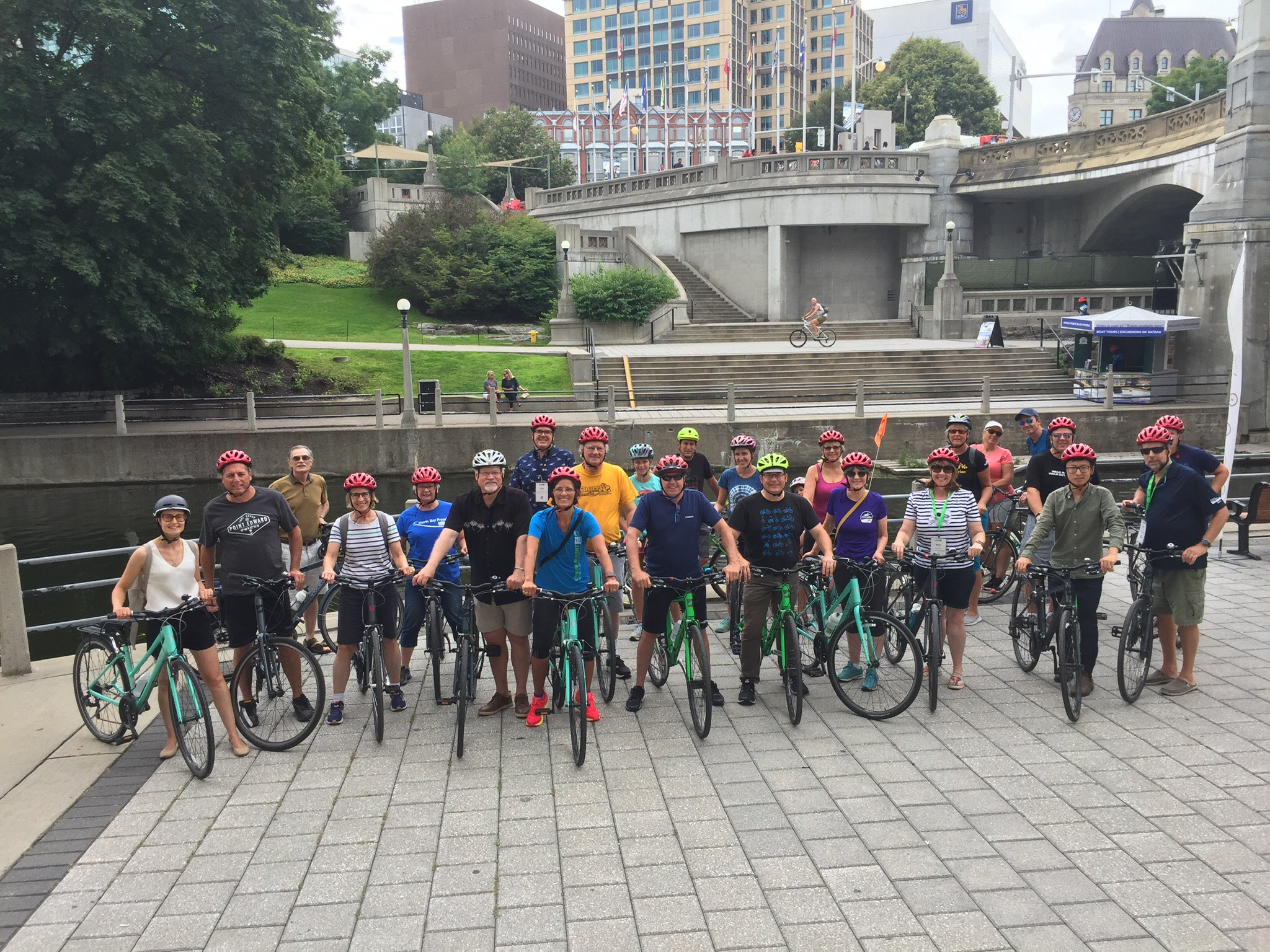 A group of urban cyclists, posing for the camera.
